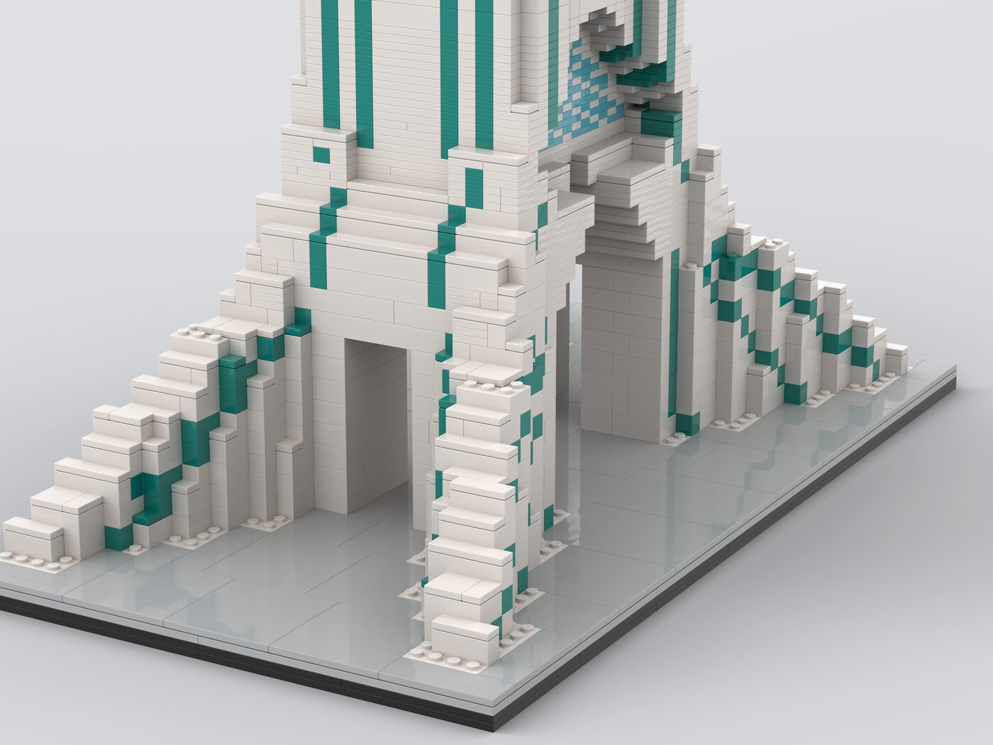 Close-up of the tower's sweeping legs and stepped foundation